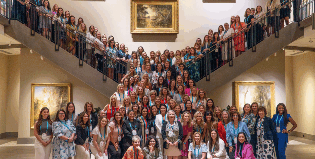 Women posed together in a big group